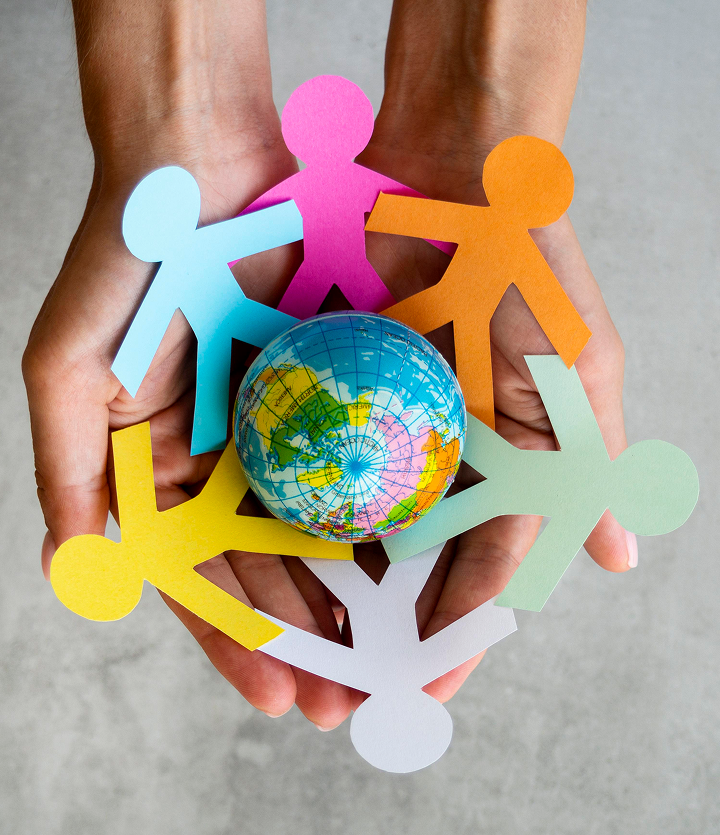 Tiny globe in hands